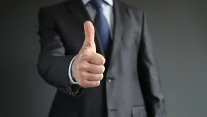 a guy giving a thumbs up