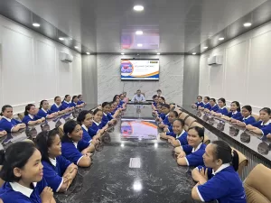 Management and tons of helpers in a meeting
